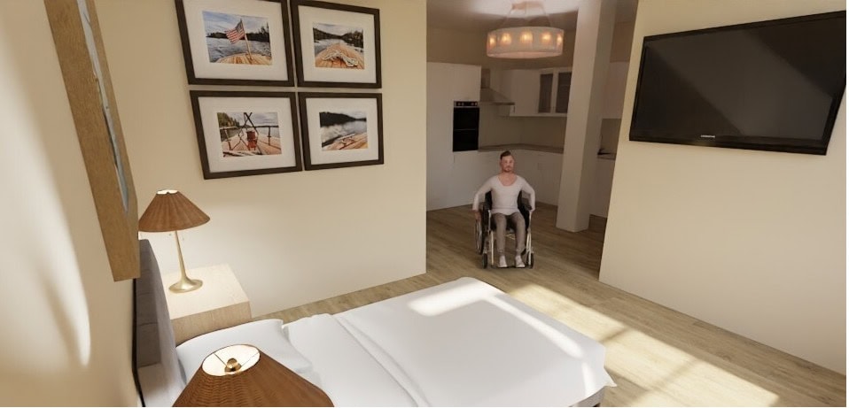 Recreación del interior de la casa donde se ve una persona desplazándose en silla de ruedas